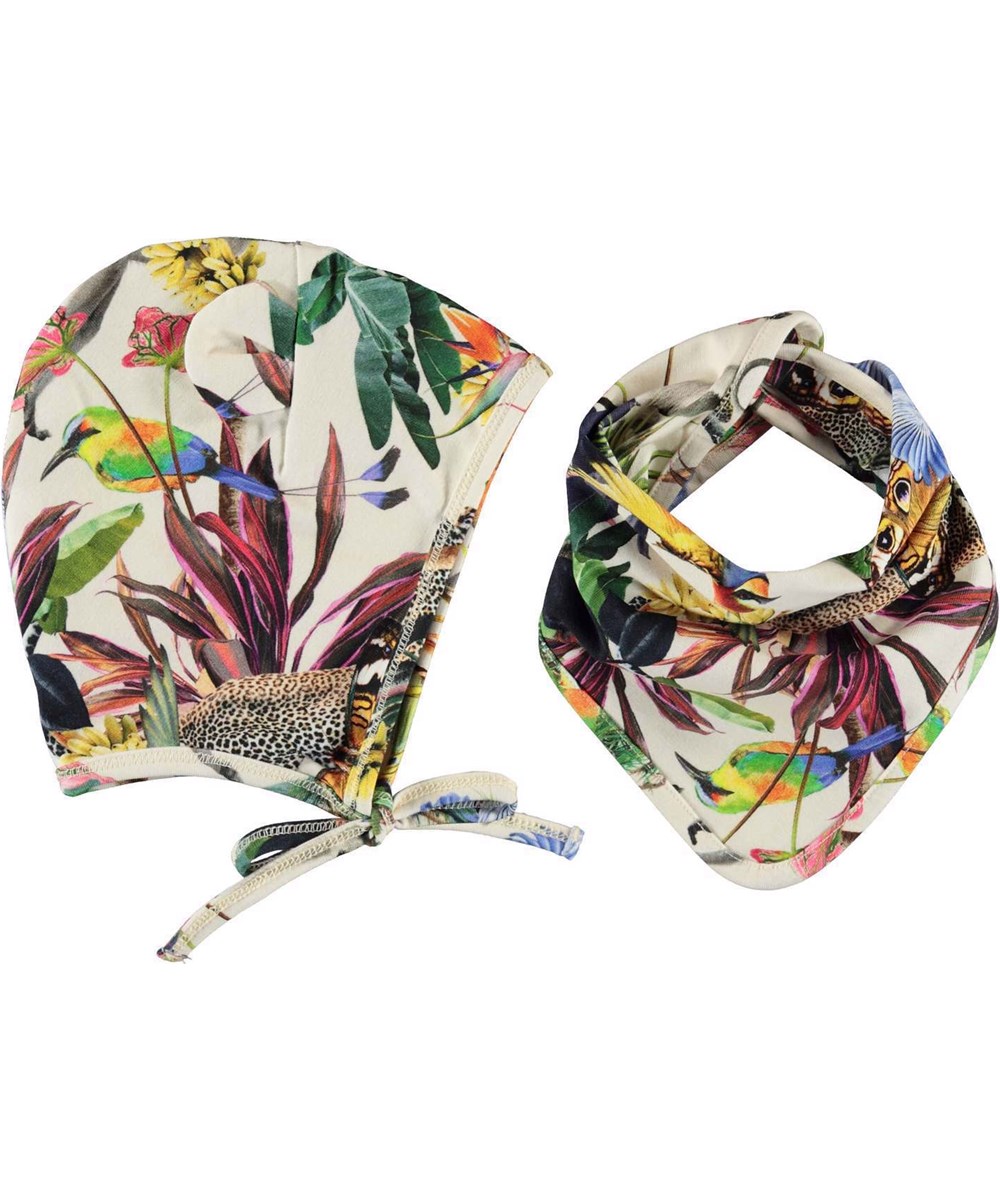 Nilo Hat and Bib Set - Imaginary Jungle - Hjälmmössa och dregglis med fantasifult djungelmöster.