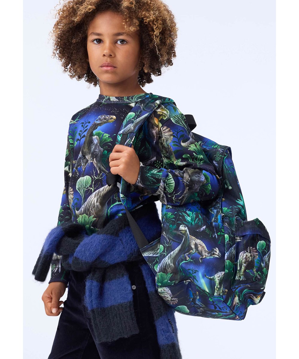 Backpack Mio - Dinorama - Färgglad ryggsäck för barn med dinosauriemönster.
