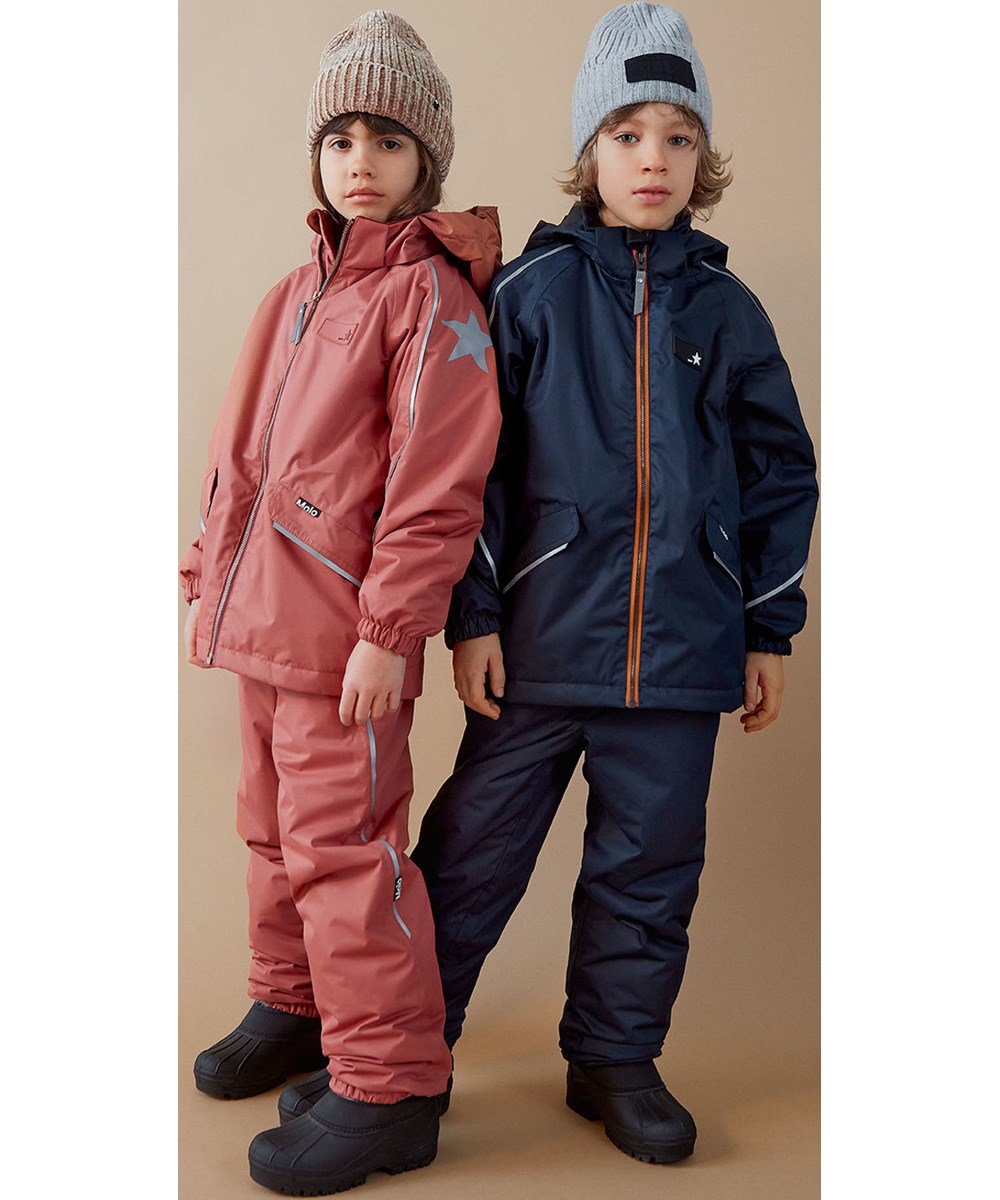 Karli - Warm Grey Melange - Gebreide kabelmuts in grijze wol