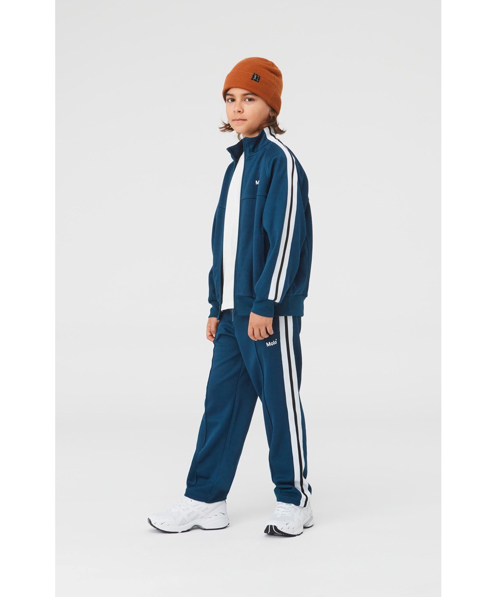 Keilo - Iron - Bruine muts met omslag in merino wol