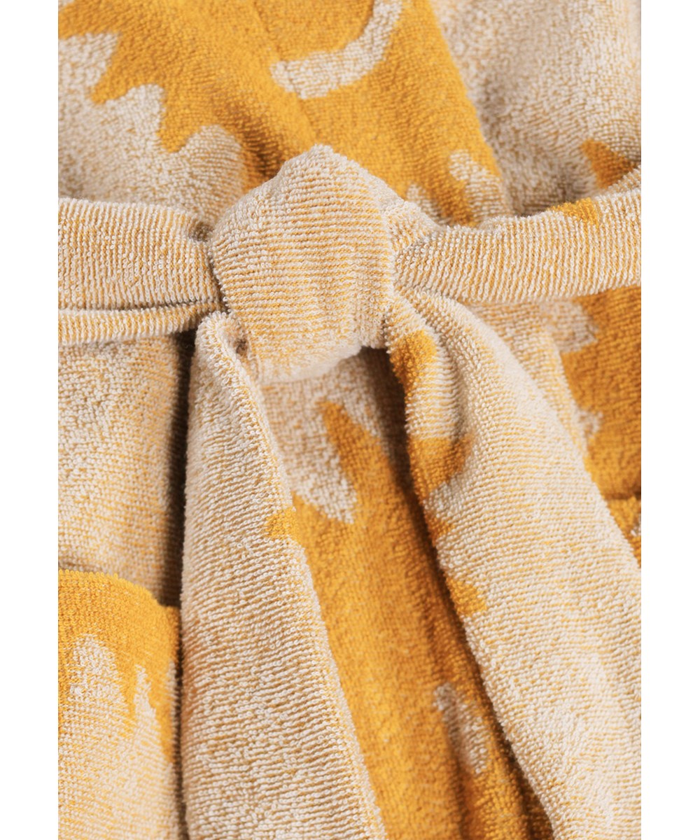 Wyn - Sunshine Terry - Beige badjas voor kinderen gemaakt van superzachte, biologische katoenen badstof met zonnenprint