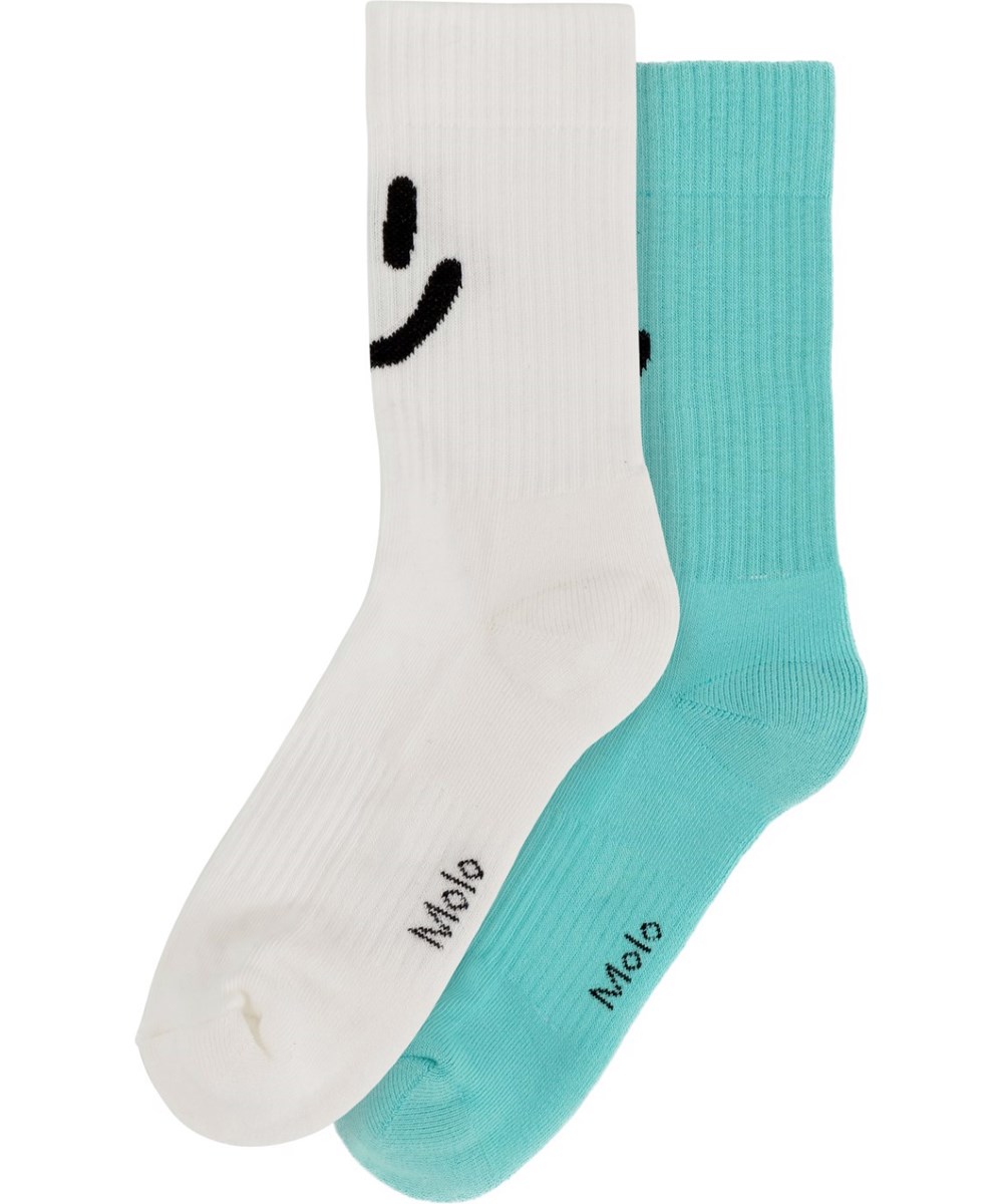 Norman - Pacific - Duopak met turquoise en witte sokken met smiley aan de achterkant in zacht katoen met ribboord en het is elastische aan de bovenkant