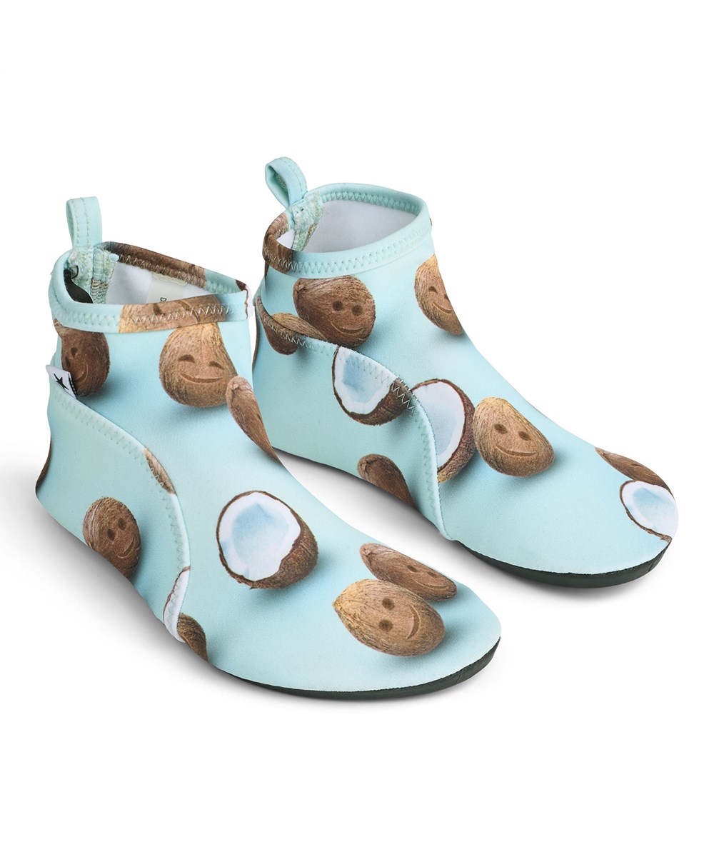 Zimba - Coquitos - Lichtgewicht waterschoenen voor kinderen van gerecycled polyester, die kleine voetjes beschermen tegen scherpe schelpen en kiezels terwijl ze voor het eerst de zee verkennen.