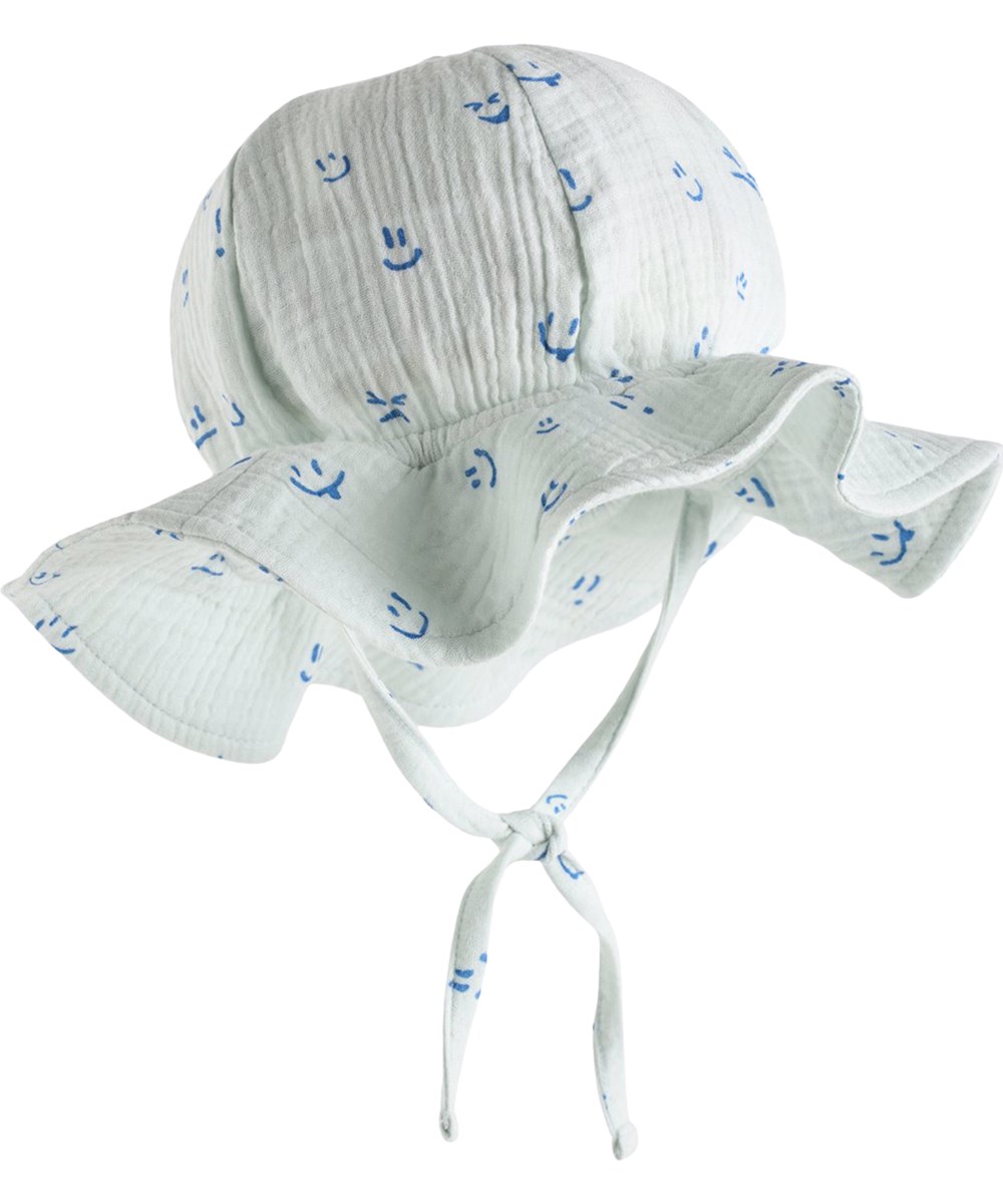 Noel - Blue Vibes - Light blue sun hat for the little ones made of organic cotton muslin with a brim and happy print