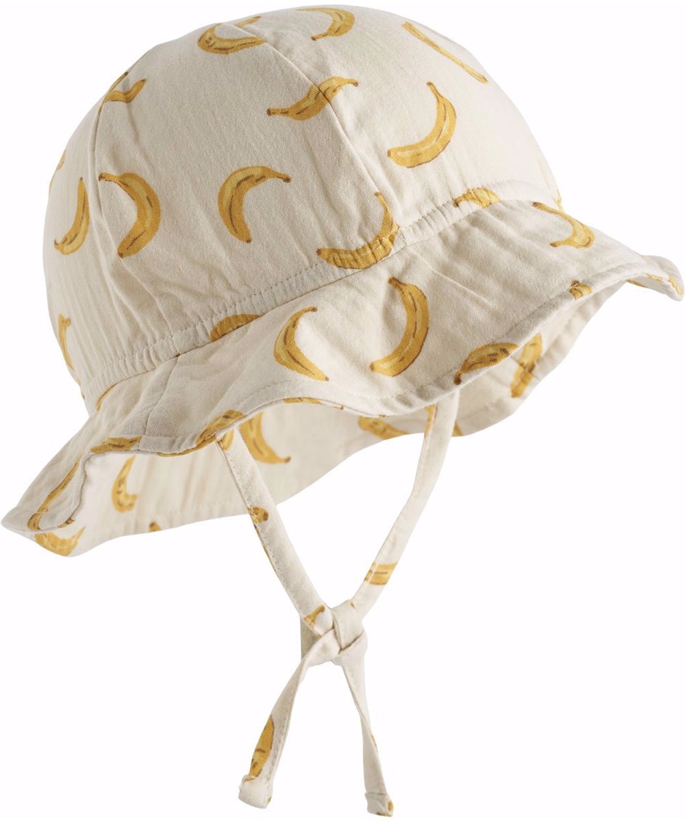 Noel - Cute Bananas - Baby hat with brim in organic cotton and banana print.