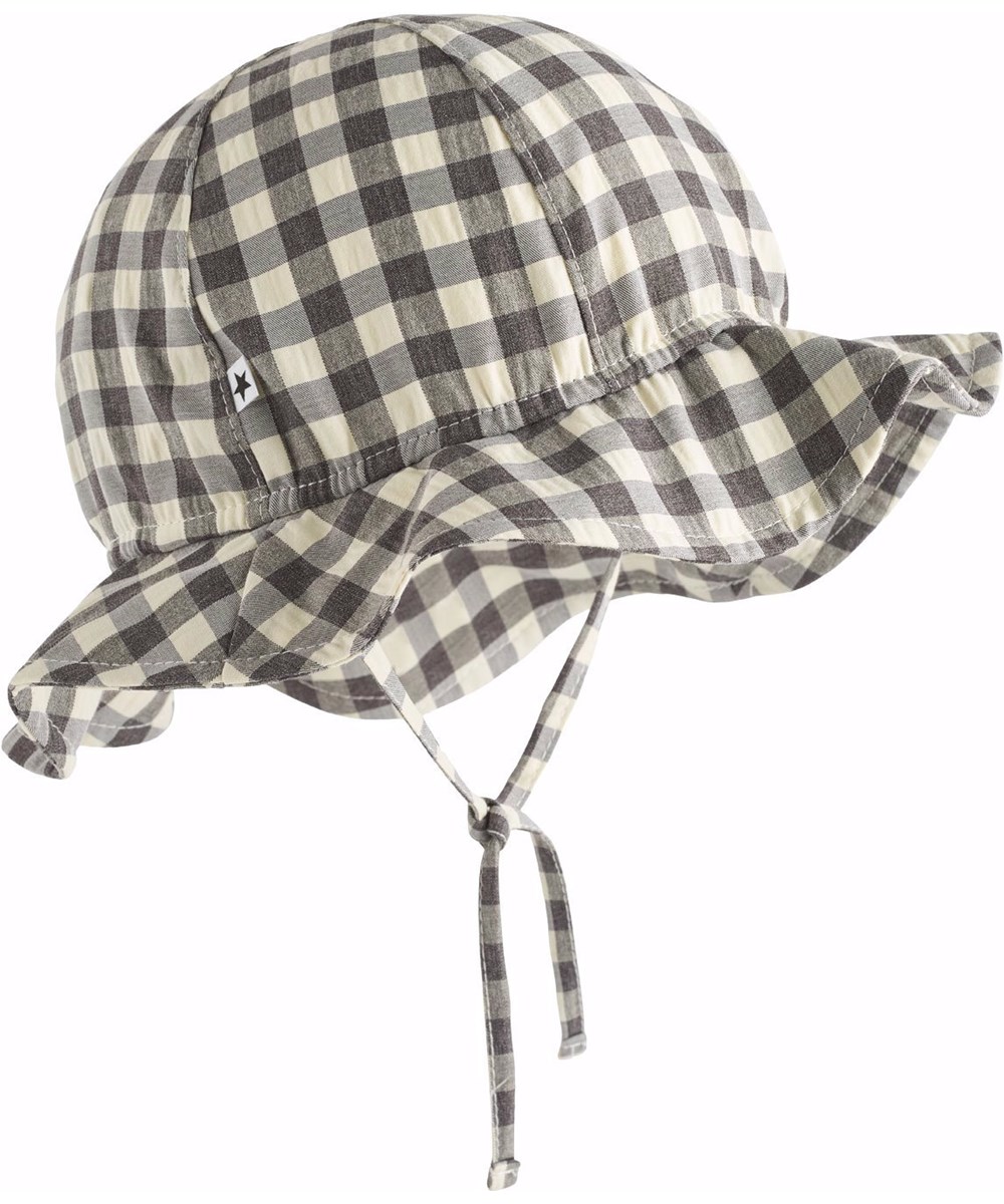 Noel - Sun Check - Black and white checkered baby hat with brim and ties.