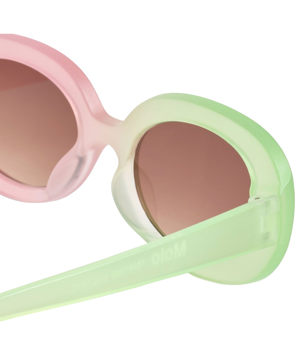 See - Pistachio - Oval sunglasses for children in green and pink with tinted lenses, satin finish, and UV protection.