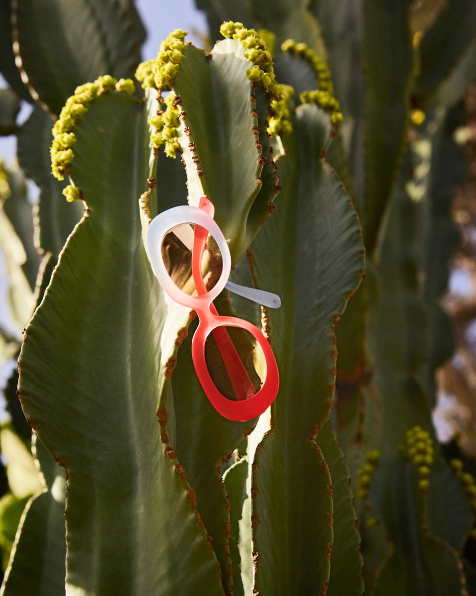 See - Purple Petal - Oval children's sunglasses in red and light lilac with tinted lenses, satin finish, and 100% UV protection.
