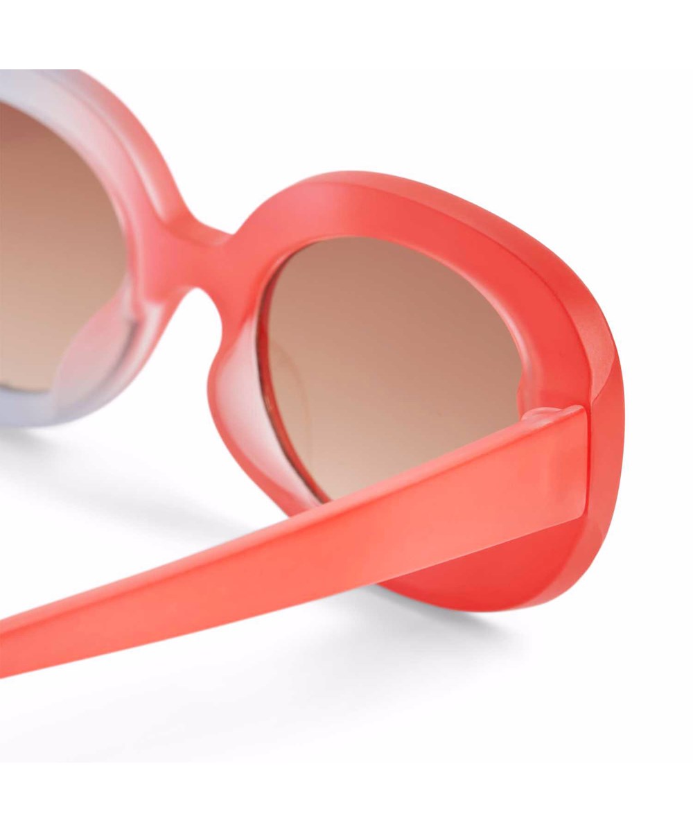 See - Purple Petal - Oval children's sunglasses in red and light lilac with tinted lenses, satin finish, and 100% UV protection.
