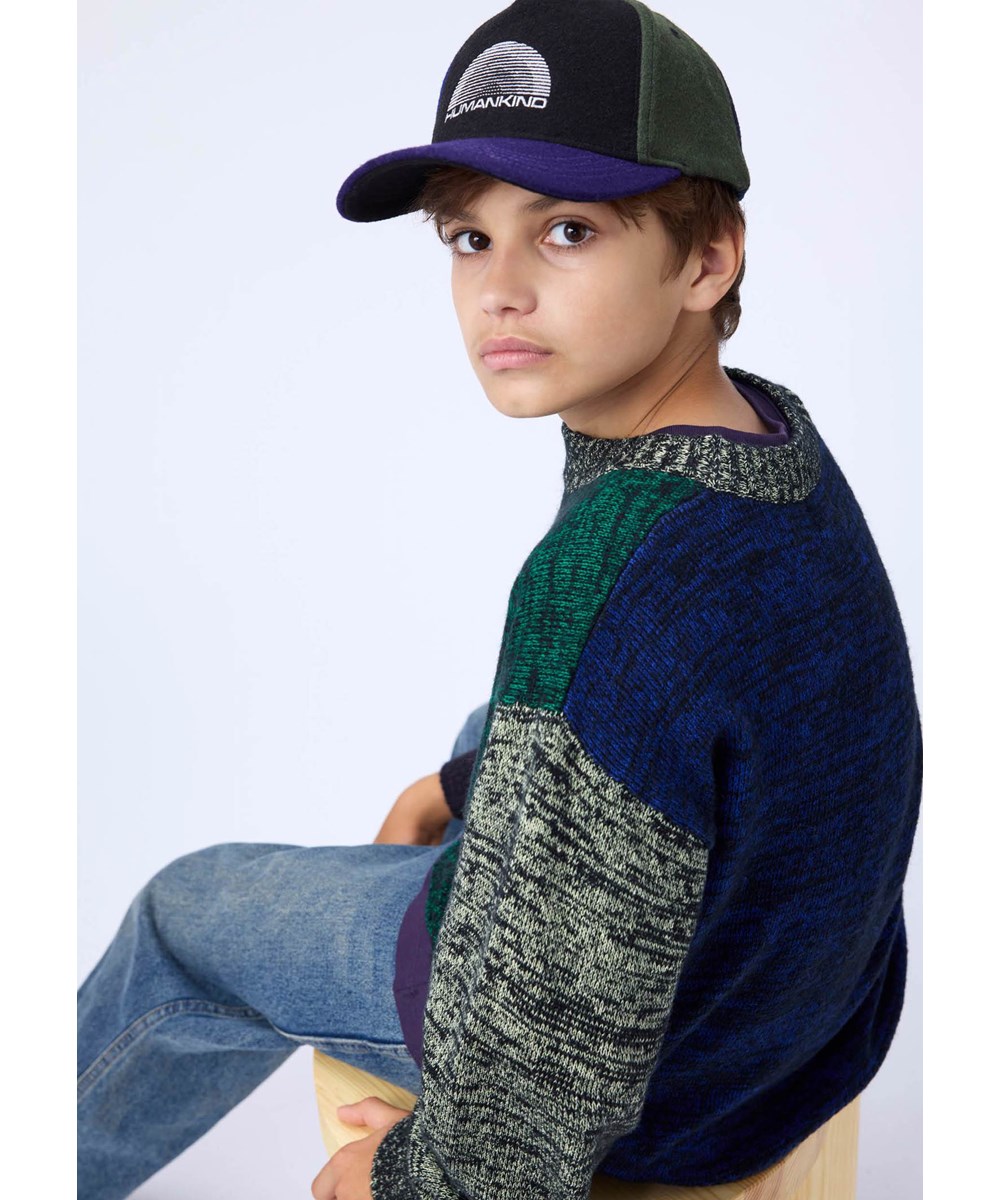 Skill - More Colours - Multicolored capfor children in a woven wool quality.