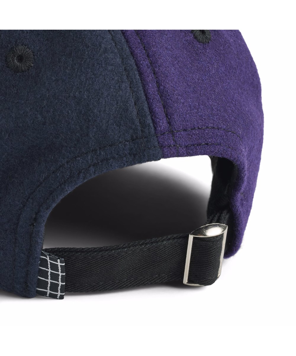 Skill - More Colours - Multicolored capfor children in a woven wool quality.