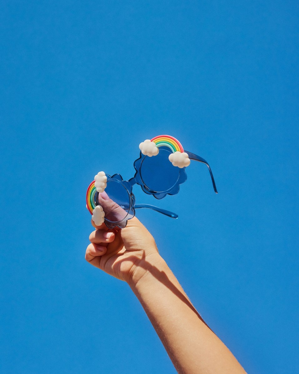 Sky Rainbow - Sparkling Sea - Sky-shaped, blue sunglasses for children with rainbows with tinted lenses and UV protection.