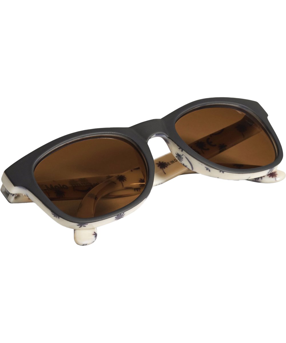 Star - Palm Blue - Classic sunglasses for children in black and beige with palm print and UV protection.