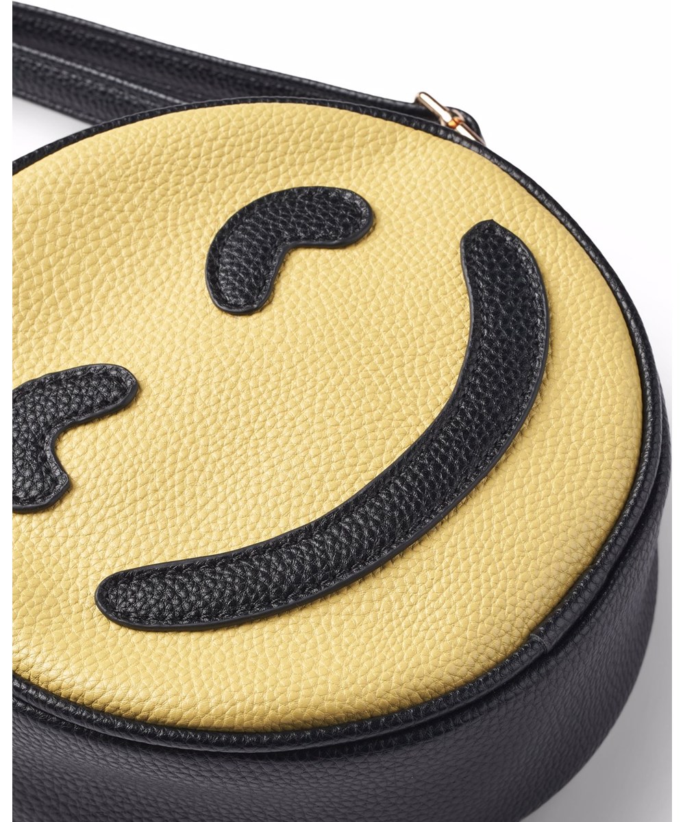 Feelings Bag - Duo - Fun round bag with a smiling yellow face and a purple sour face for children.