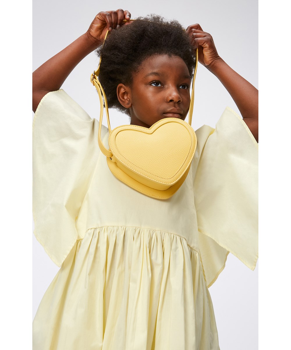 Heart Bag - Pale Sun - Yellow, heart shaped bag in faux leather with adjustable strap and zipper 