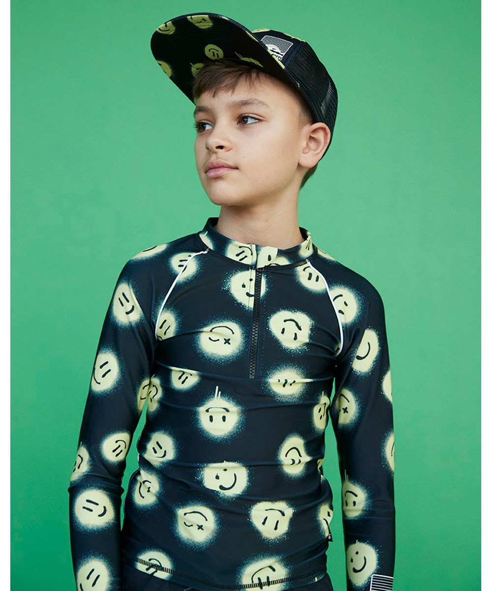 Big Shadow - Happy Sunny - Cap in Schwarz mit einem Aufdruck aus gelben Smileys