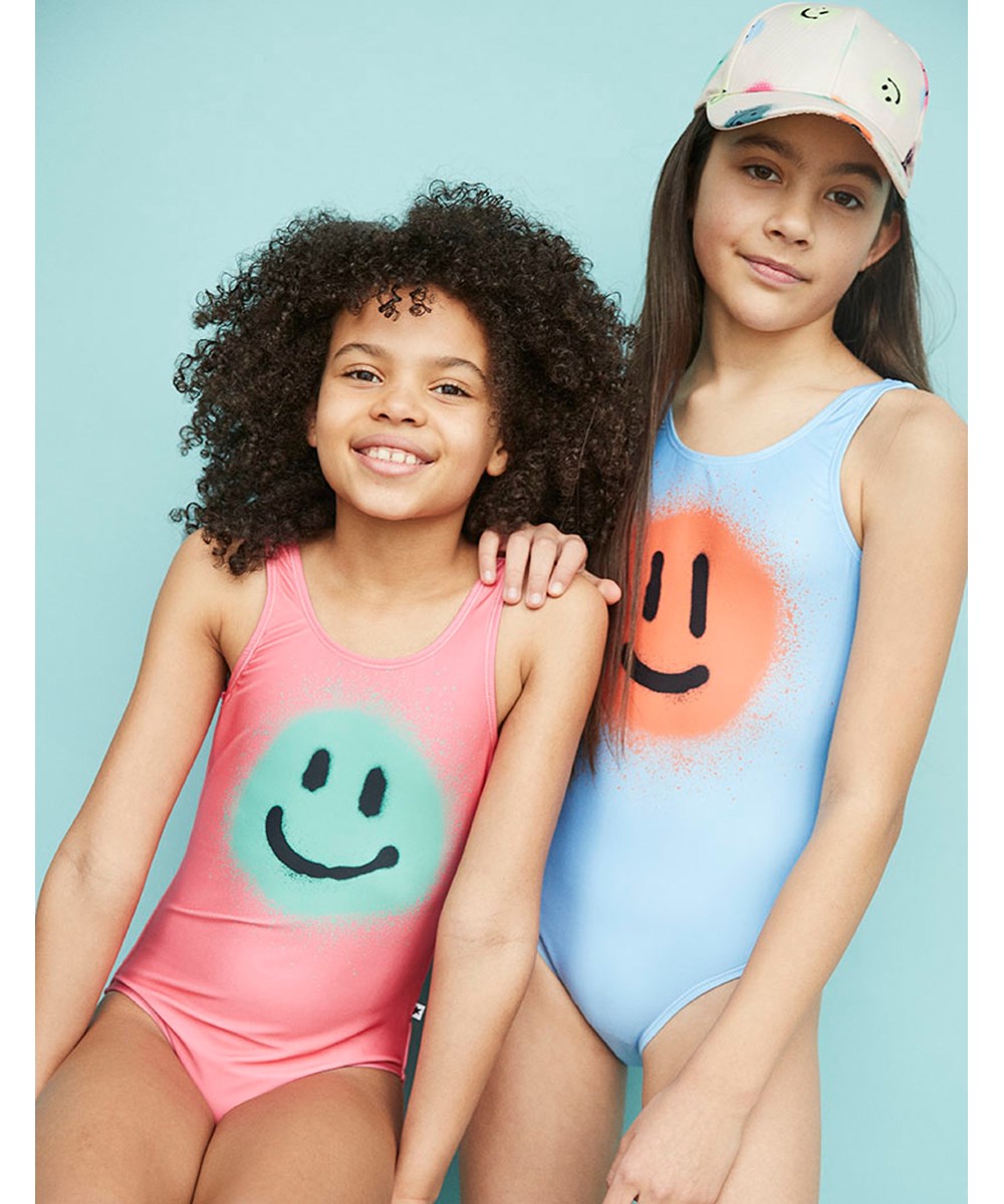 Sebastian - Happy Dots - Baseball cap with a print of different coloured smiley faces