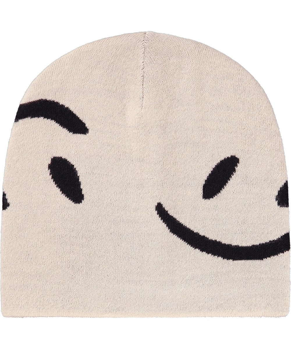 Colder - Vanilla - Cream-colored knitted beanie with black smiling faces for children.