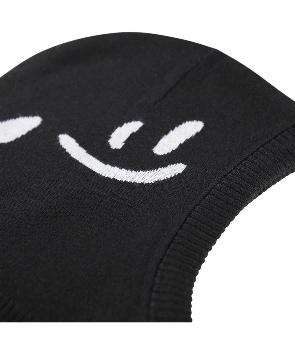 Snow - Black - Black balaclava for children with white smiling faces.