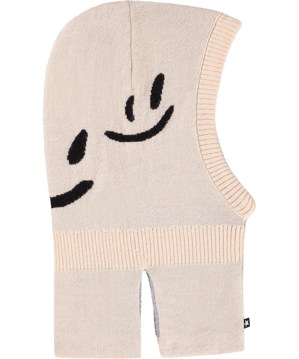 Snow - Vanilla - Cream-colored balaclava for children with black smiling faces.