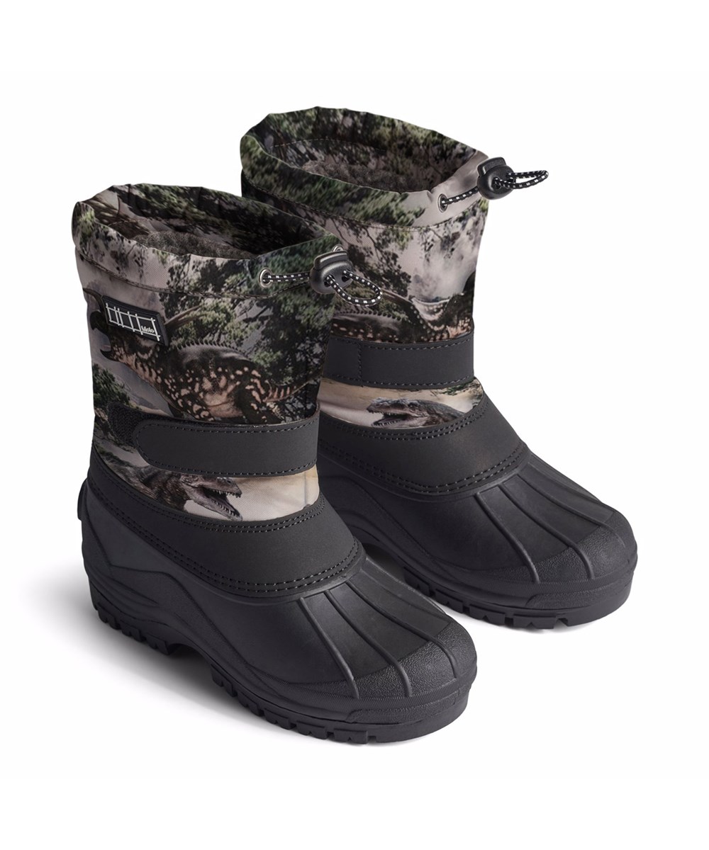 Driven - Rocky Dino - Praktische Winterstiefel für Kinder mit einem Dinosaurier-Druck und einer robusten und rutschfesten schwarzen Sohle.