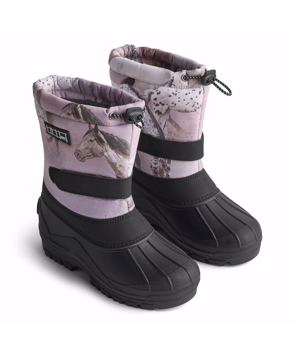 Driven - Dreamy Horses - Practical winter boots for children with a sturdy and non-slip black sole and a print of horses on a dreamy background in shades of pink and purple.