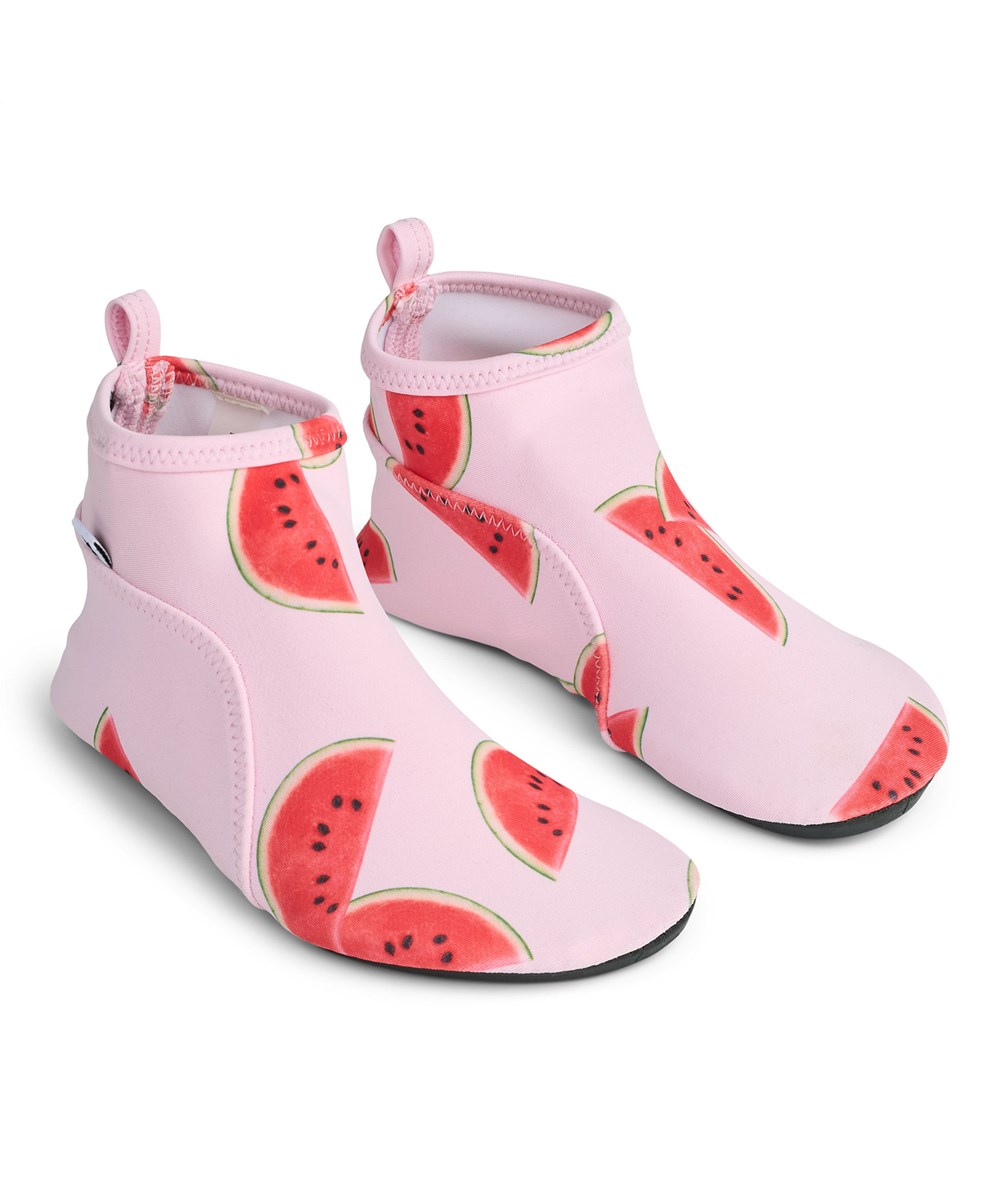 Zimba - Melon Pink - Lightweight children's water shoes made from recycled polyester, protecting little feet from sharp shells and pebbles as they explore the sea for the first time.
