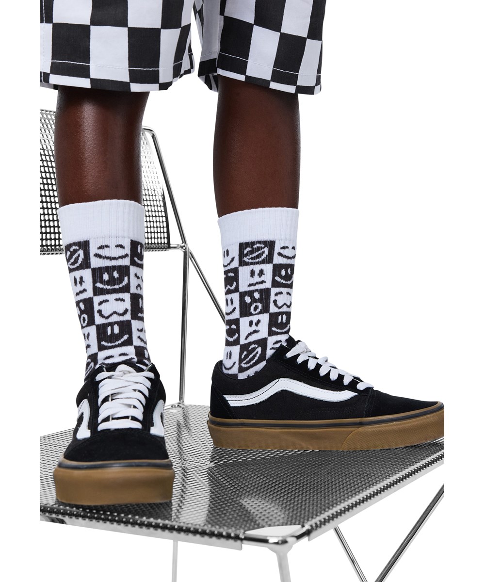 Norman - Blue White - 2-pack socks for children made of black/white and blue cotton with a chequered mood motif