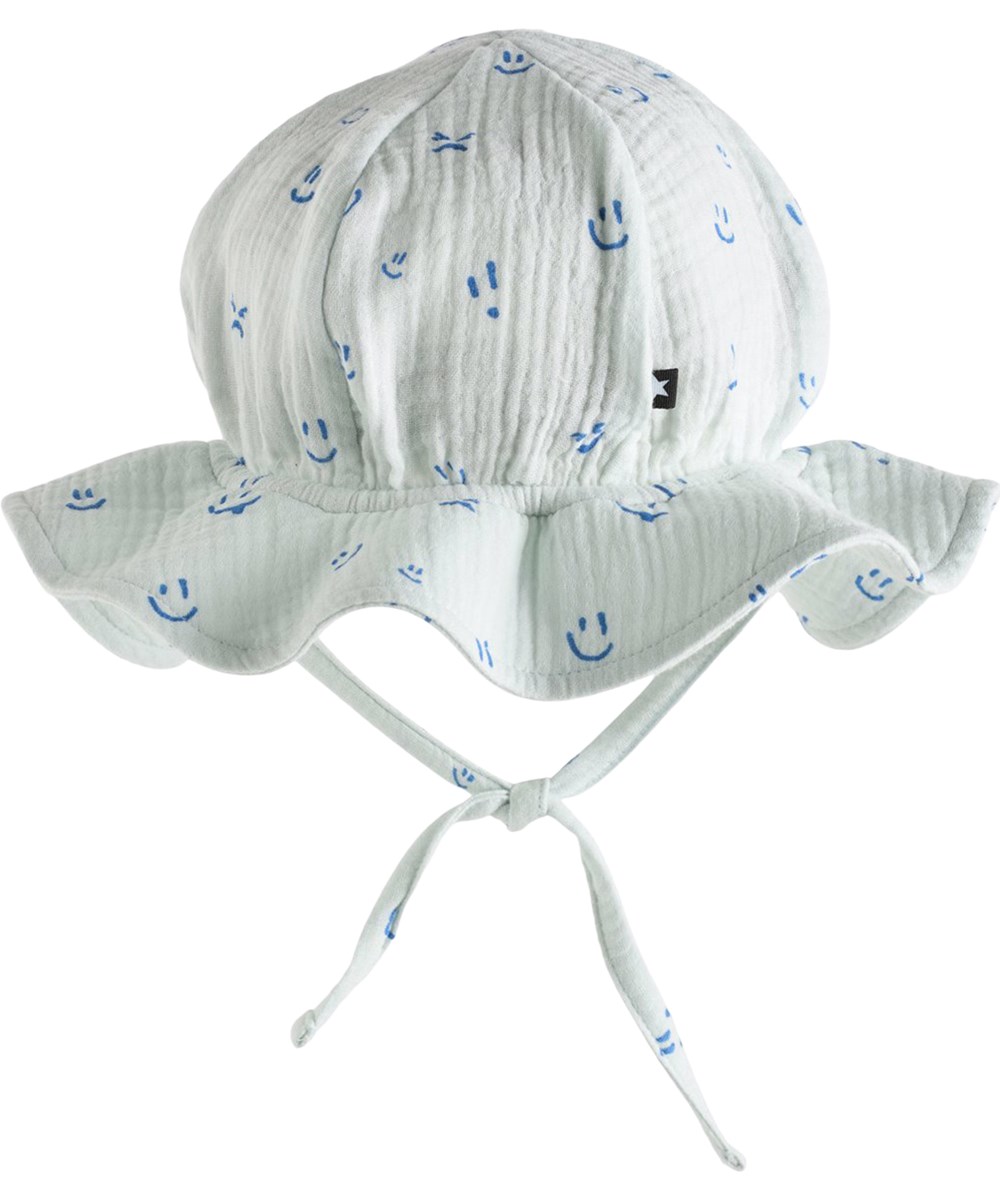 Noel - Blue Vibes - Lyseblå solhat til baby med skygge og happyprint i økologisk bomuldsmusselin