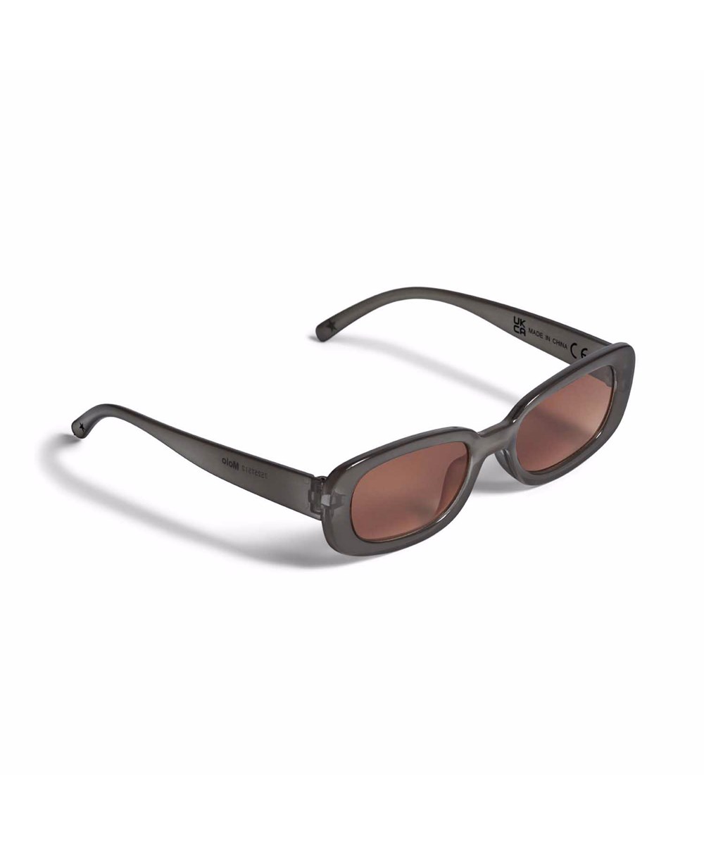 Selah - Black - Oval børne solbrille i sort med tonede glas, blank overflade og 100% UV-beskyttelse