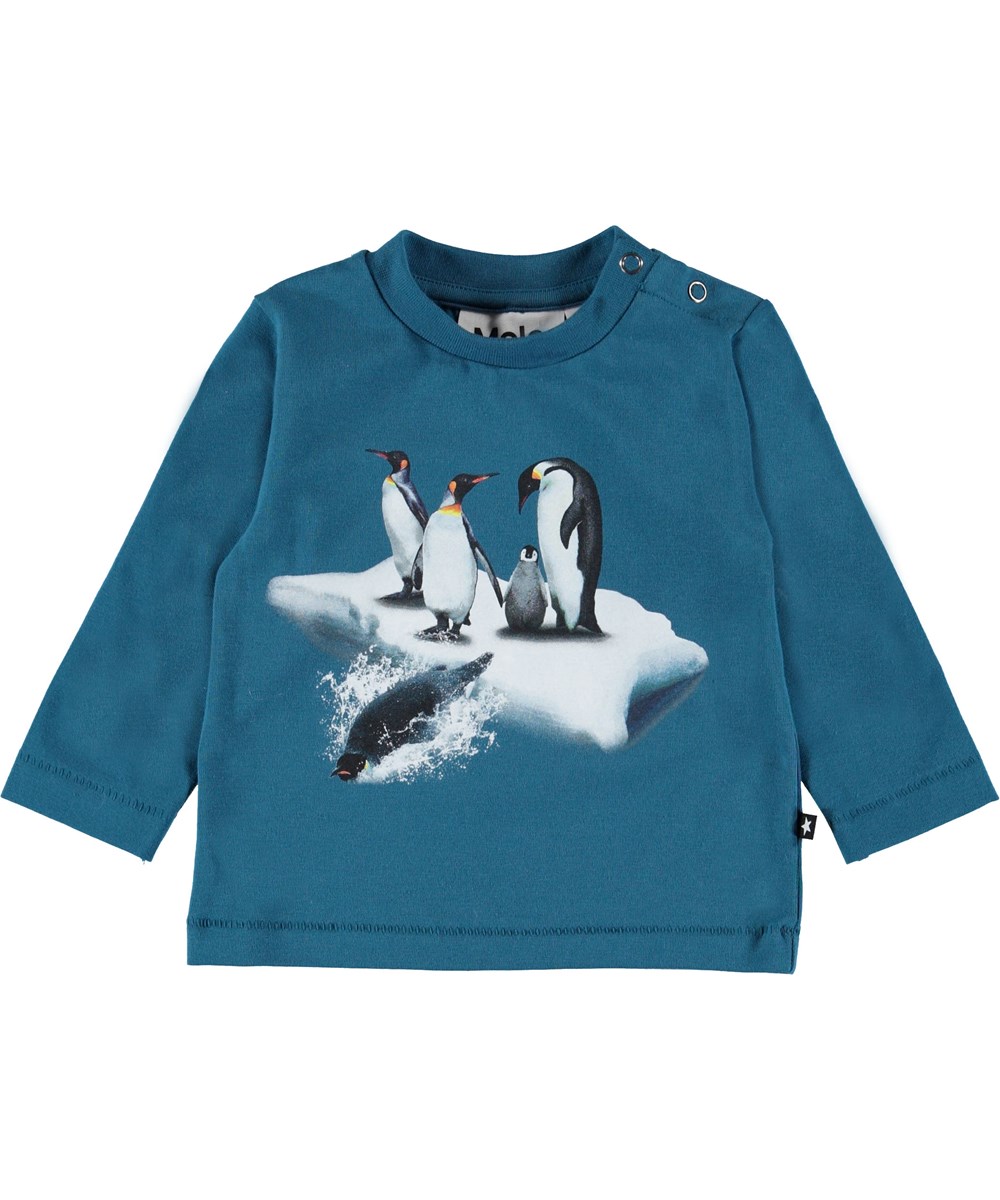 Enovan - Frozen Deep - Blue baby top with penguins.