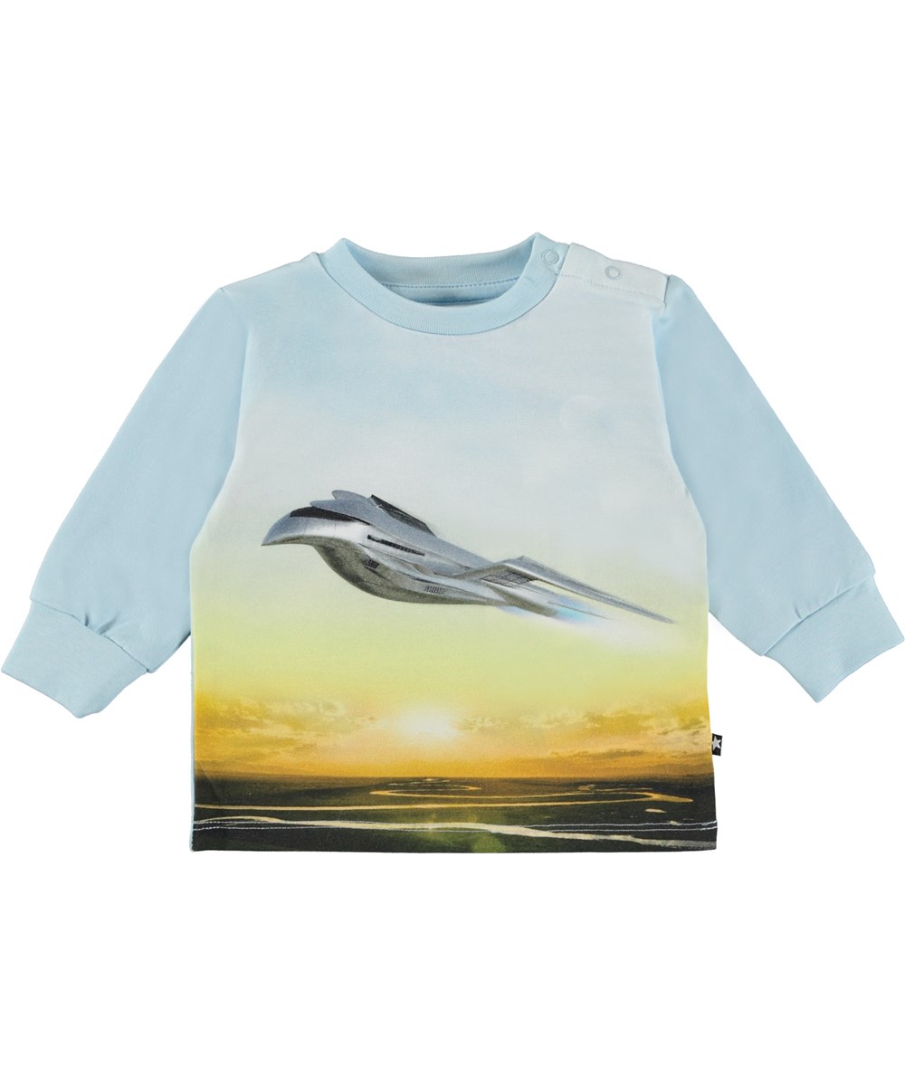 Eloy - Flying - Økologisk lyseblå babybluse med fly