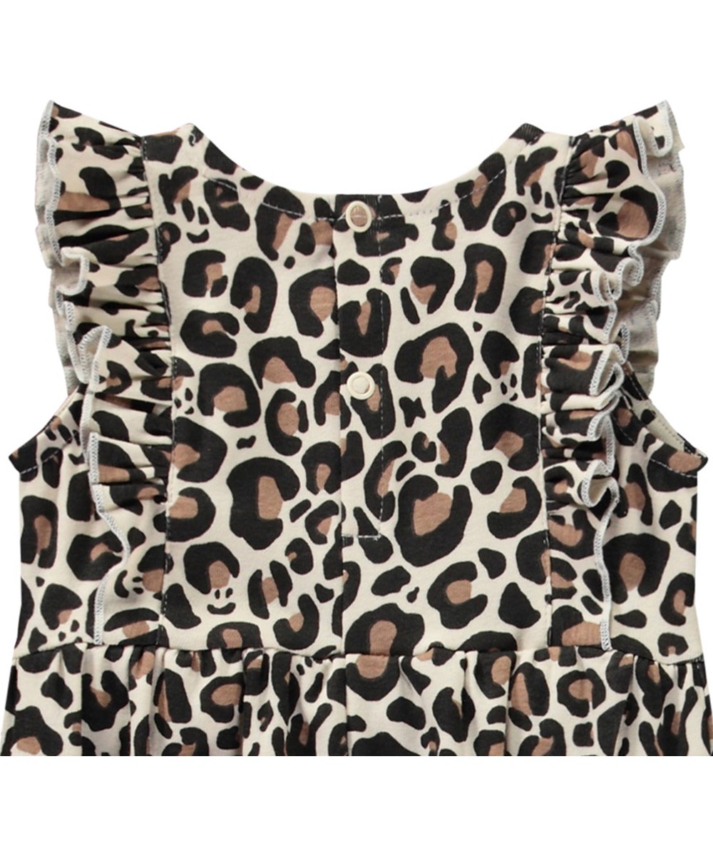 Fallon - Jaguar Sand - Jumpsuit för de små i mjuk ekologisk bomull med jaguartryck.