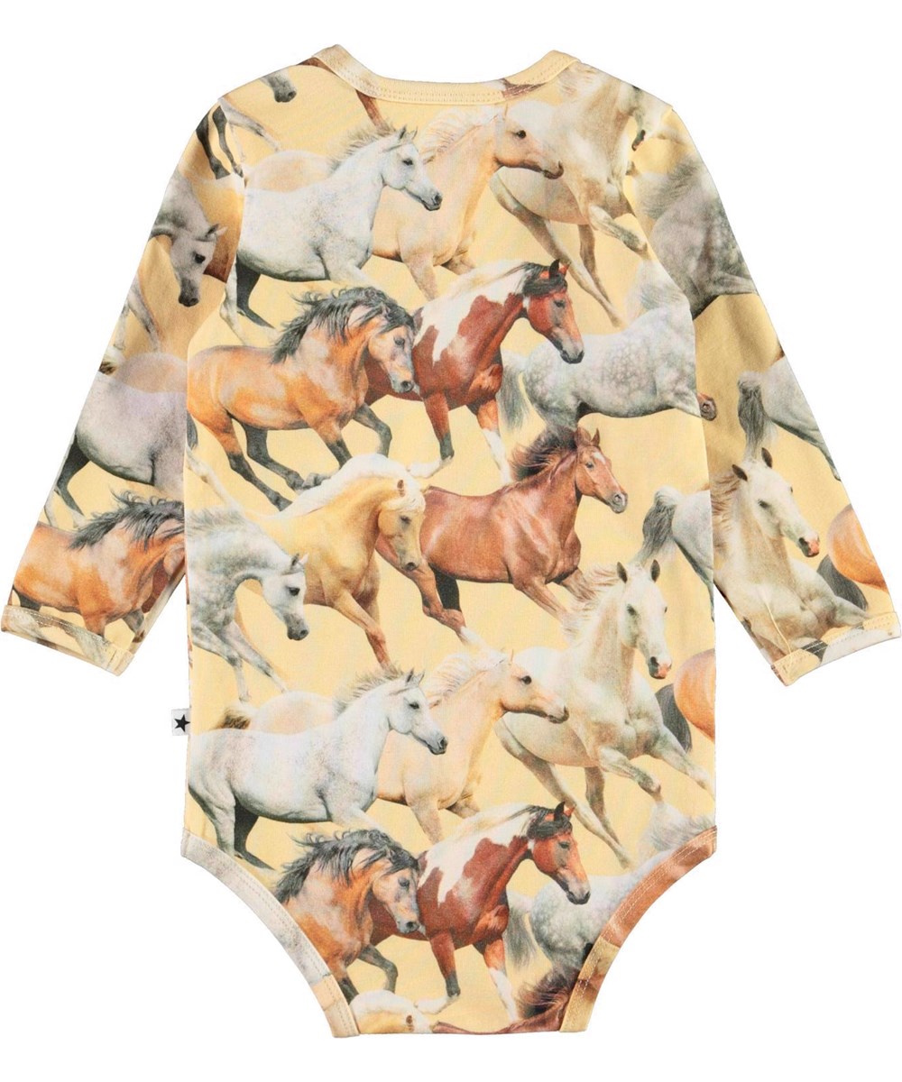 Foss - Horse Dreams Baby - Ljusgul ekologisk babybody med hästar.