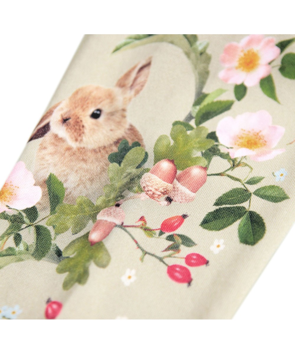 Simeon - Forest Squirrel - Mjuka ljusgröna byxor med ekorrar och blommönster i ekologisk bomull för baby.