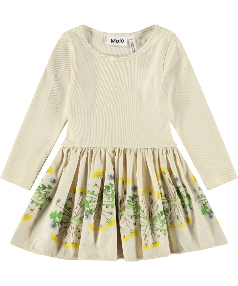 Candi - Baby Dandelion - Långärmad klänning för baby i ekologisk bomull. Klänningen är gul med maskrosmönster..