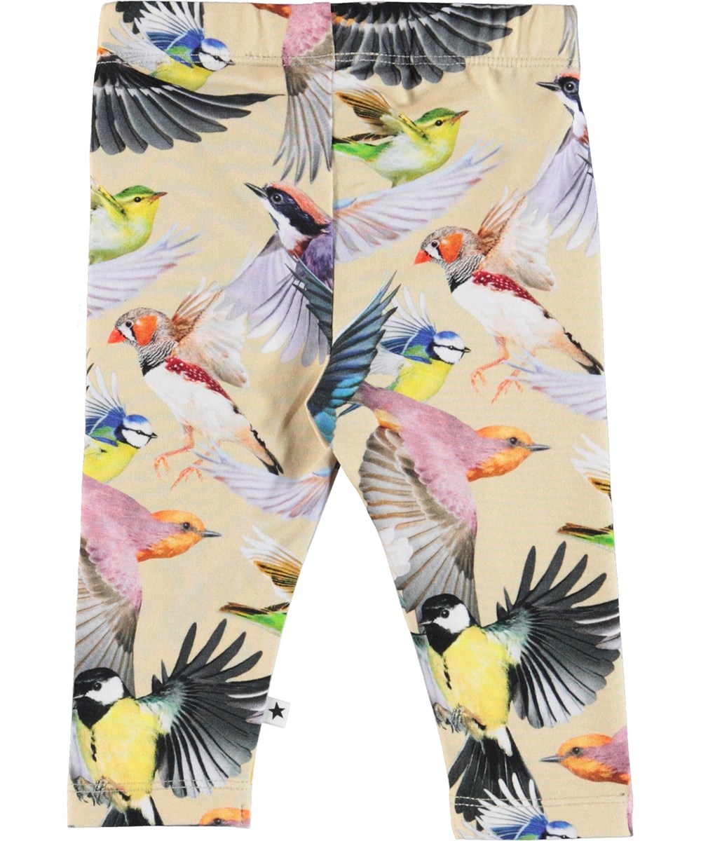 Stefanie - Whimsical - Ekologiska babyleggings i ljusgul med fåglar.