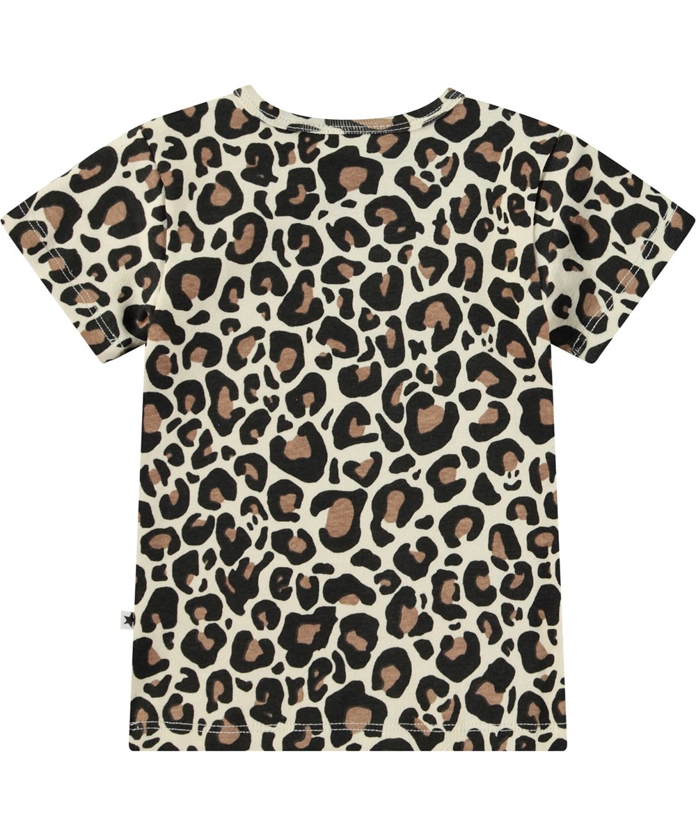 Elvira - Jaguar Sand - T-shirt i ekologisk bomull för baby. T-shirten har en heltryckt jaguartryck.