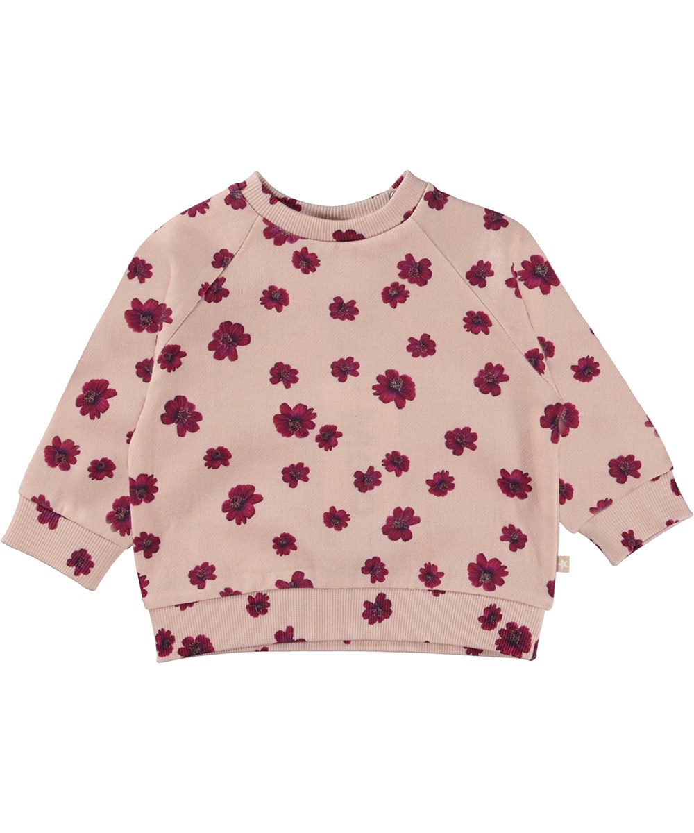 Dicte - Chocolate Daisy - Ekologisk rosa babytröja med blommigt mönster.