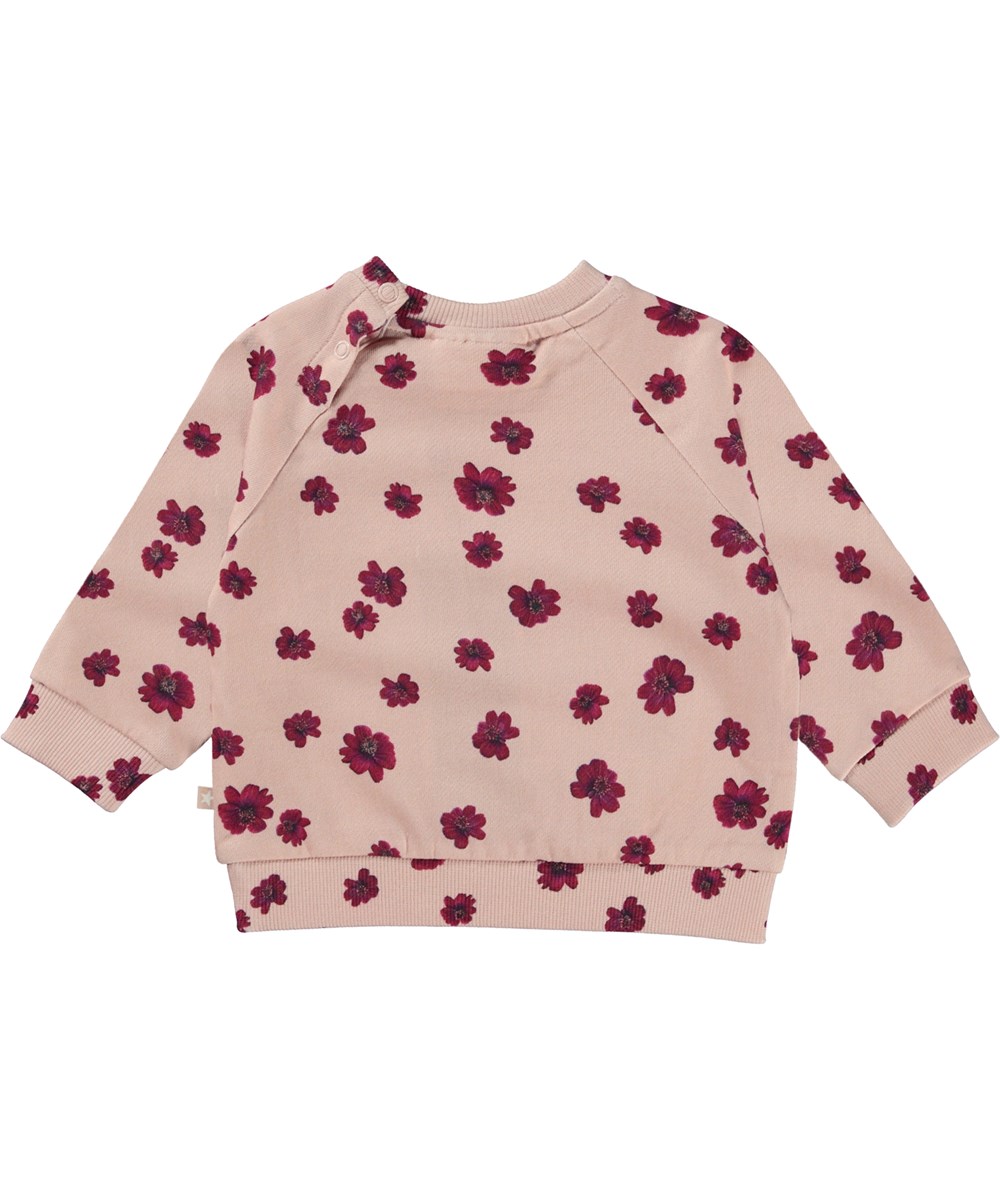 Dicte - Chocolate Daisy - Ekologisk rosa babytröja med blommigt mönster.