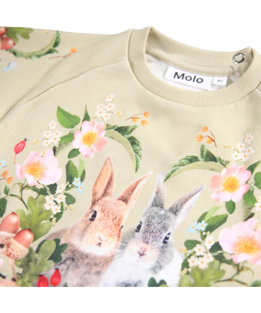 Disc - Forest Bunny - Ekologisk ljusgrön babytröja med kanin- och blommor.