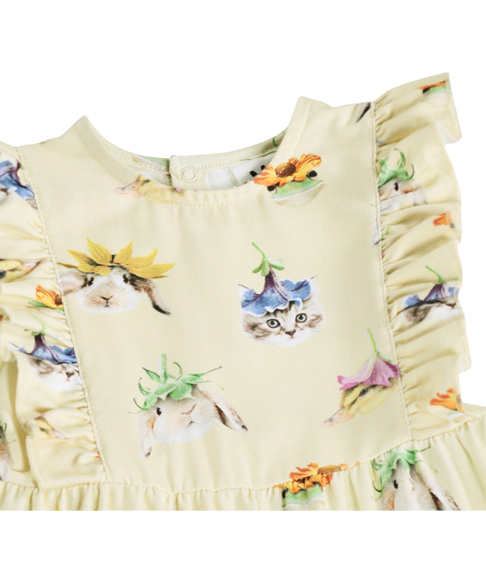 Fallon - Floral Fun Baby - Yellow jumpsuit for the little ones made of organic cotton with an animal print and ruffles