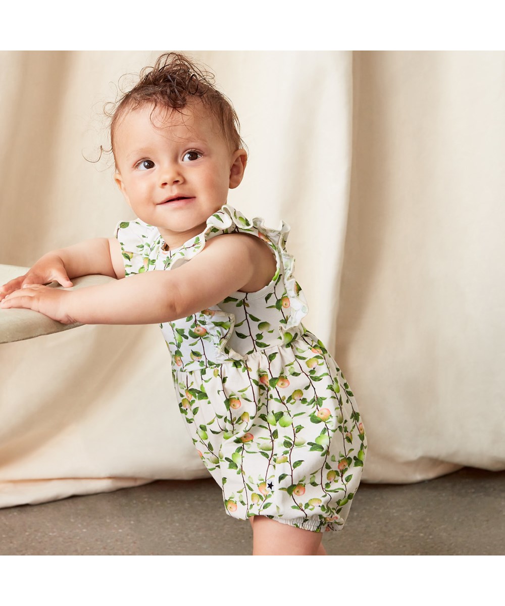 Felicia - Apples Mini - Organic baby romper with ruffles and apple print