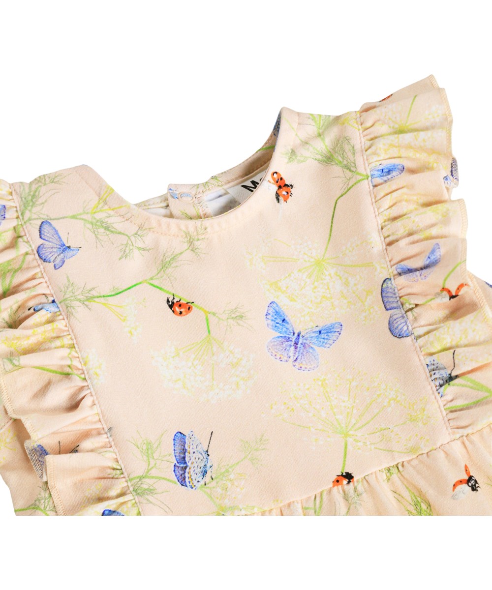 Felicia - Butterflys Cloud - Pink romper for the little ones made of organic cotton with a butterfly print