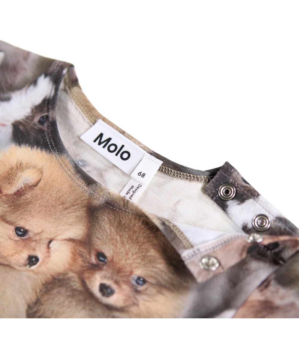 Florina - Fuzzy Fluffy - Jumpsuit for the little ones made of organic cotton with an animal print.