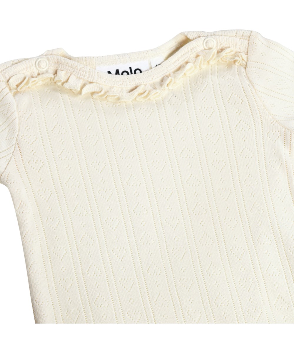 Foss - Pearled Ivory - White, long-sleeved bodysuit for the little ones made of organic cotton pointelle with ruffles