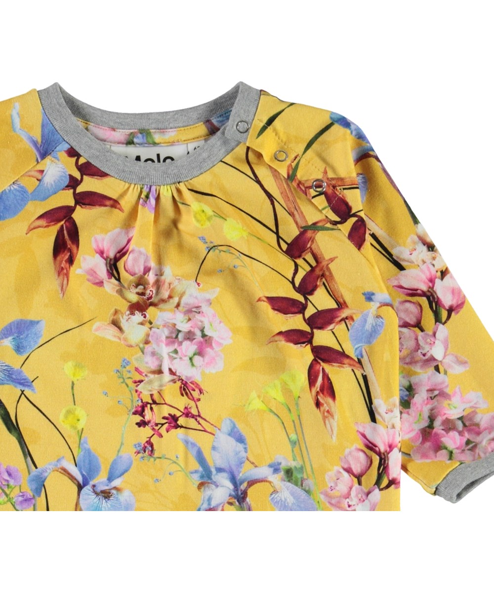 Francine - The Art Of Flowers - Yellow organic baby romper