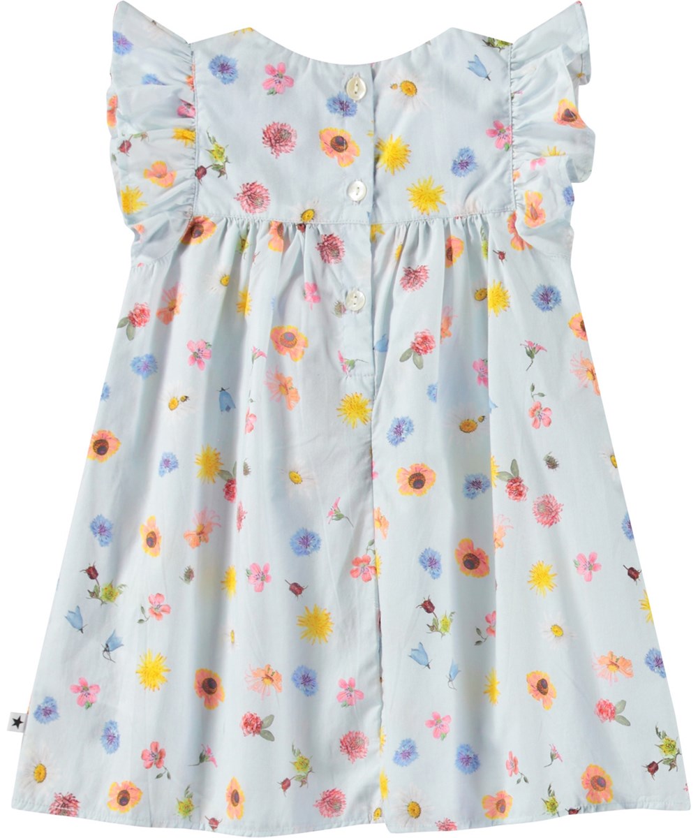 Cacao - Small Flowers Baby - Dress in organic cotton poplin for baby. The dress is light blue with a floral print.