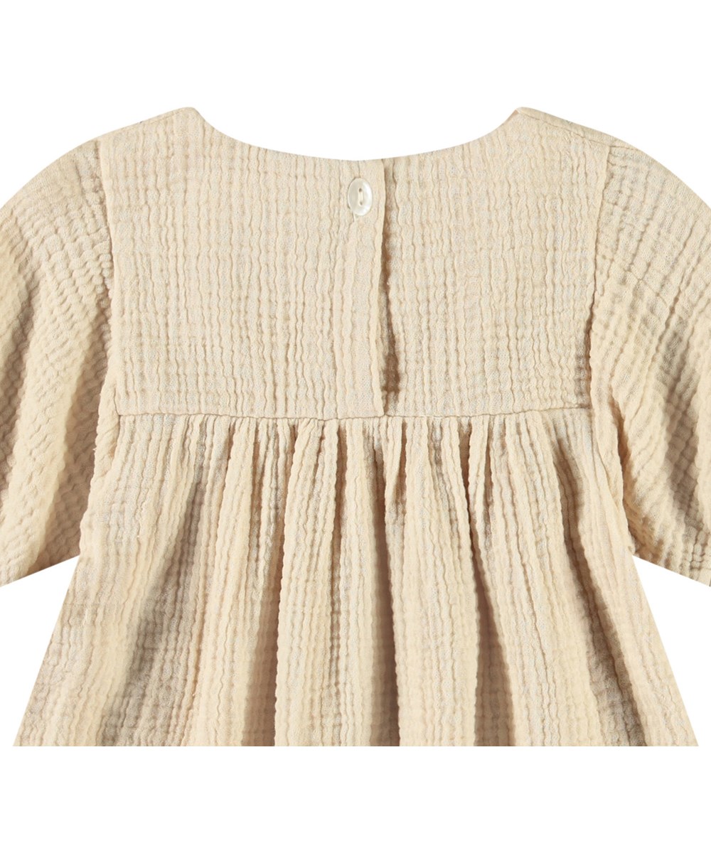 Calee - Brazilian Sand - Beige organic cotton crepe dress for baby.