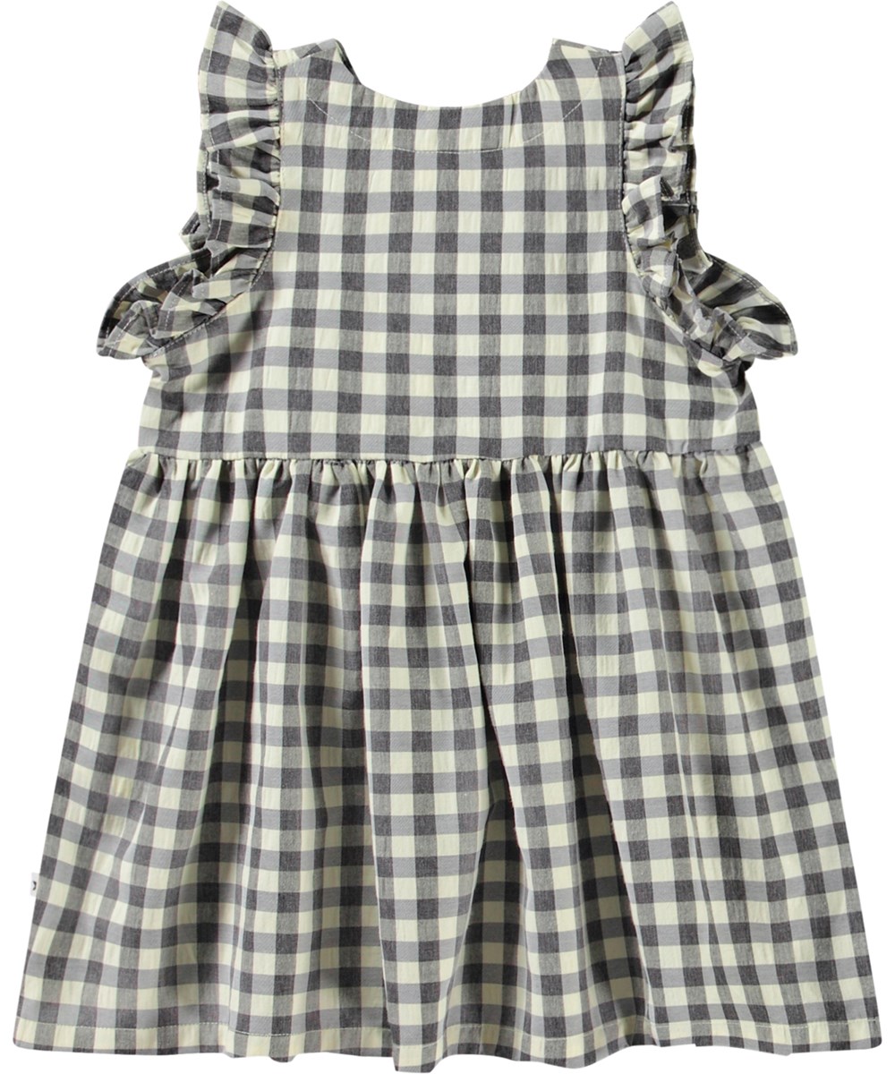 Callie - Sun Check - Black and white checkered dress in organic cotton with cute details for a baby.